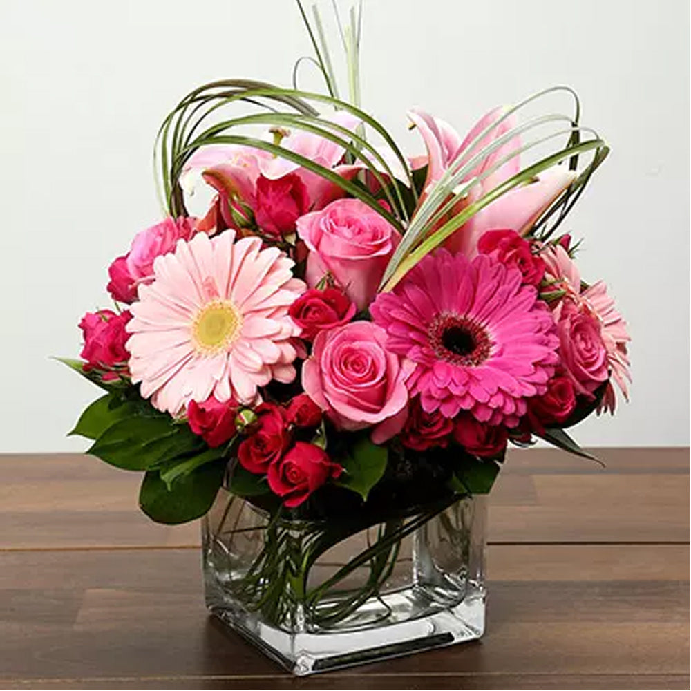 Onam - Roses and Gerbera Arrangement In Glass Vase